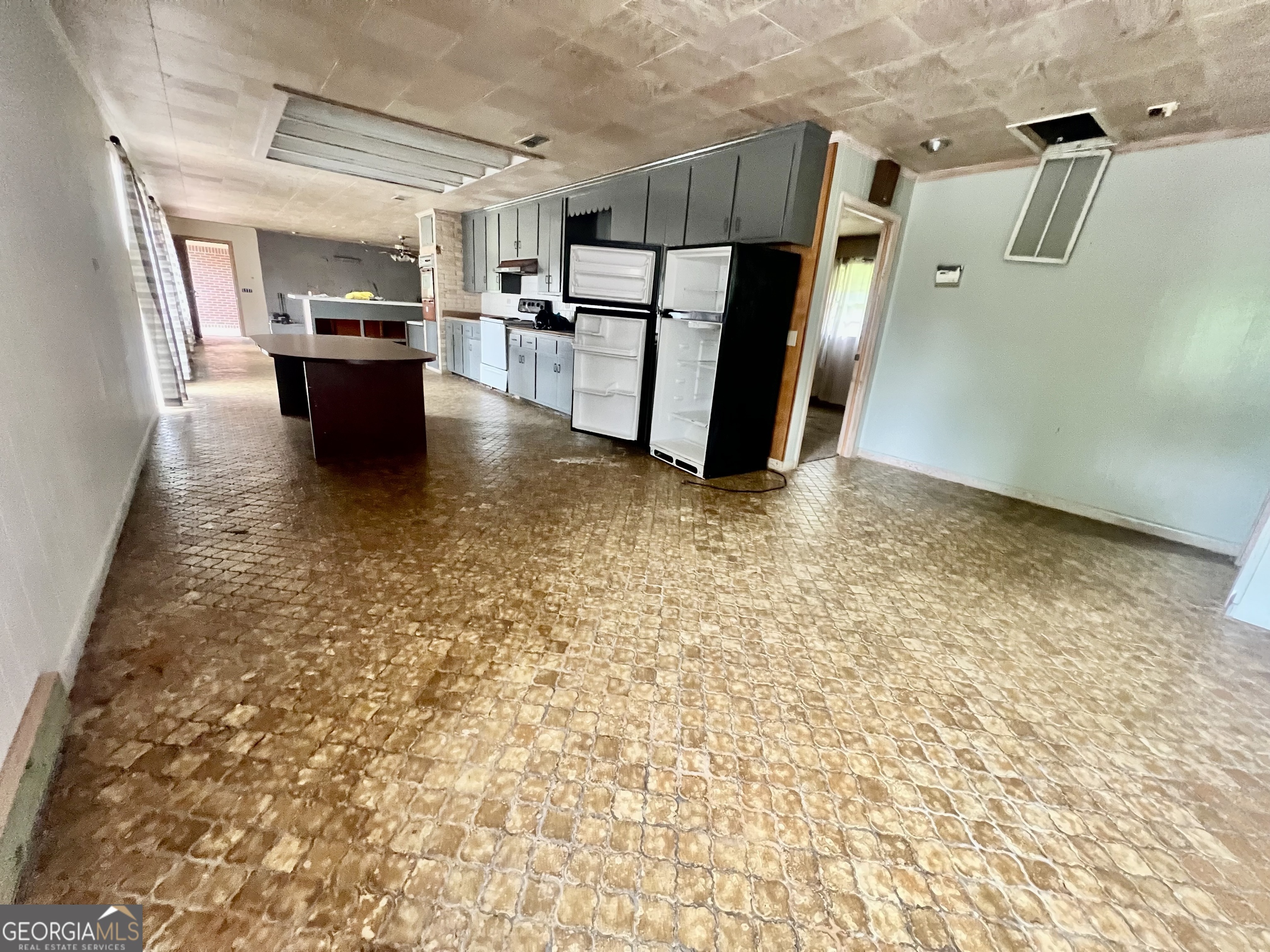 1165 Jaybird Springs Road Chauncey, GA 31011 - Photo 10 of 43 a view of a kitchen with a sink