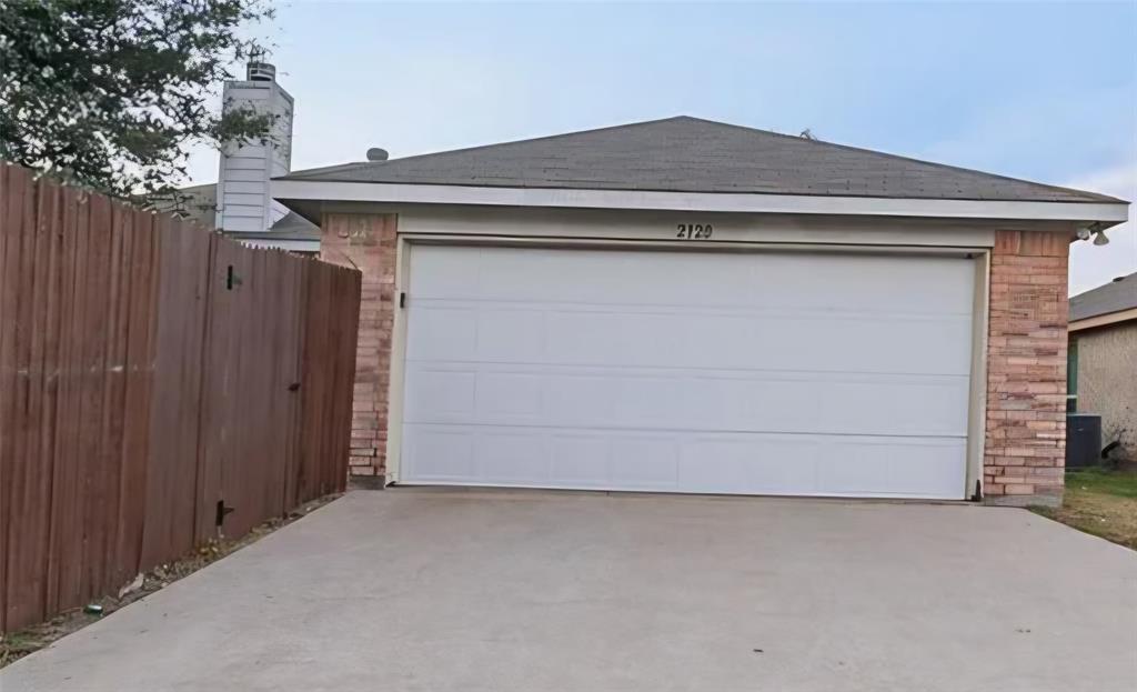 2120 Stonewood Drive Lancaster, TX 75134 - Photo 11 of 16 Two-car garage