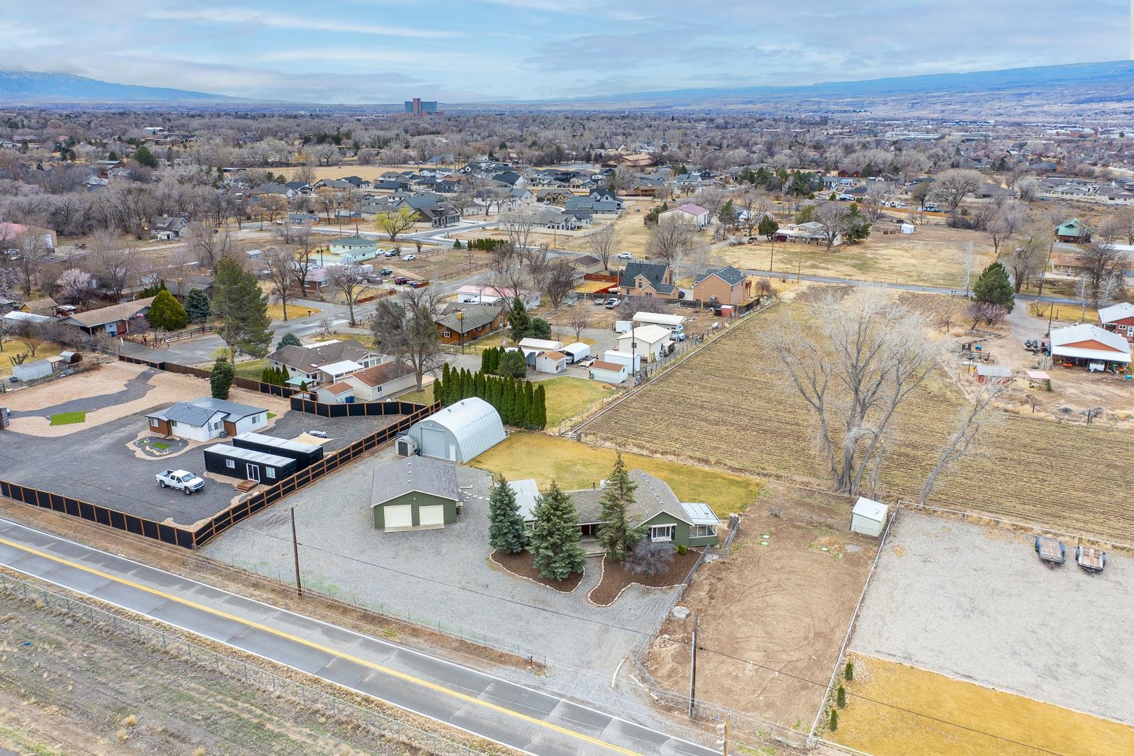 2527 G G 1/2 Road Grand Junction, CO 81505 - Photo 36 of 39 an aerial view of residential houses with outdoor space