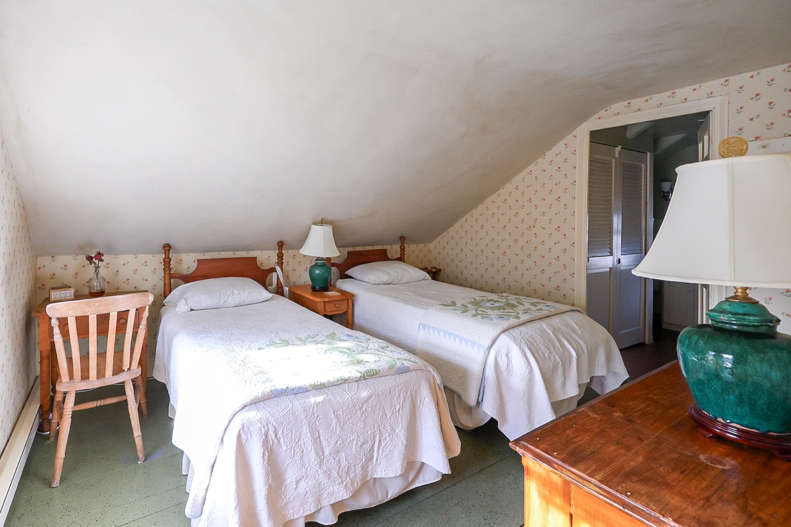 1 Beaver Street Nantucket, MA 02554 - Photo 23 of 28 a bedroom with two beds and a lamp