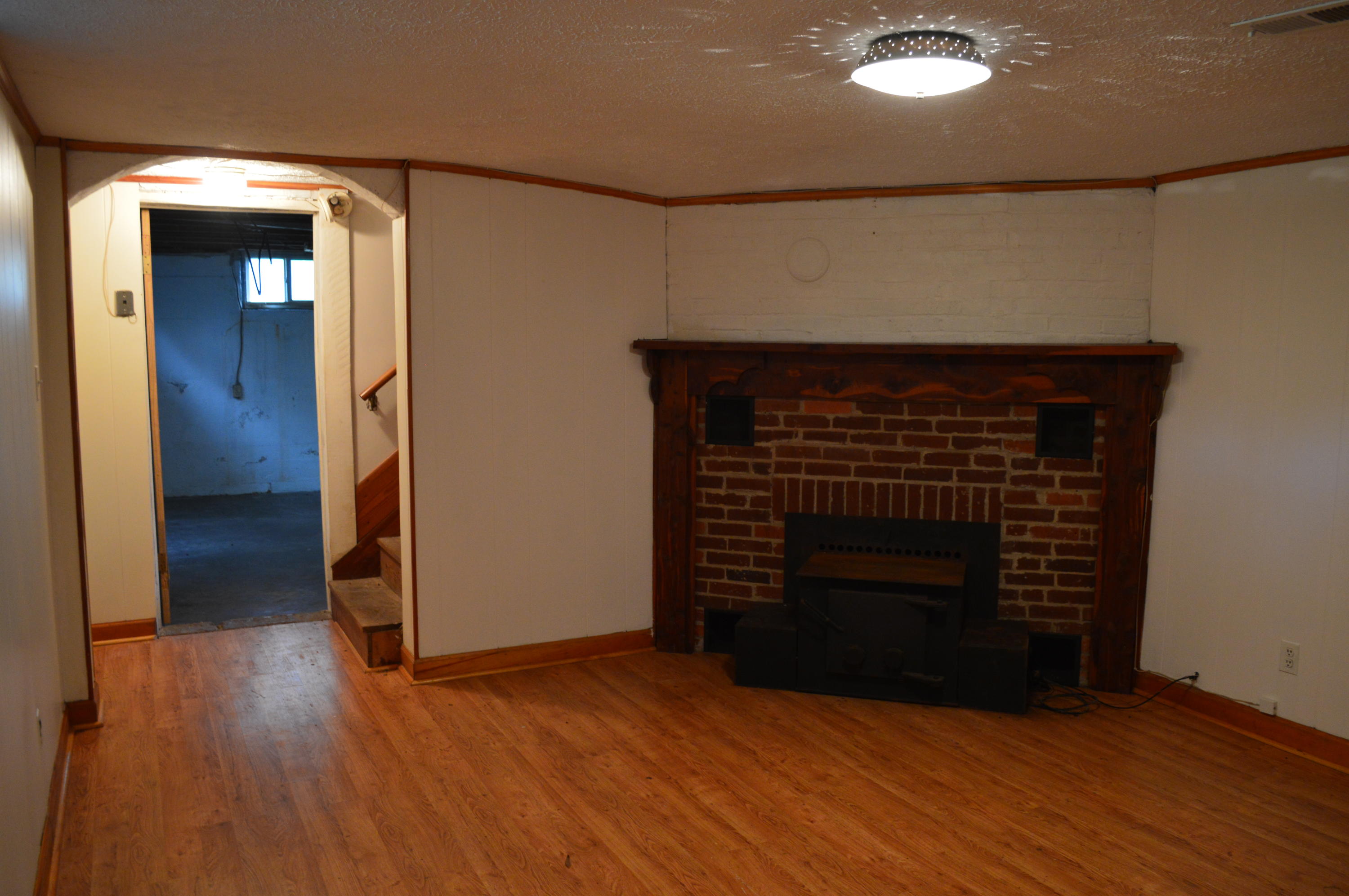 8745 Callands Road Chatham, VA 24531 - Photo 22 of 37 a view of an empty room and wooden floor
