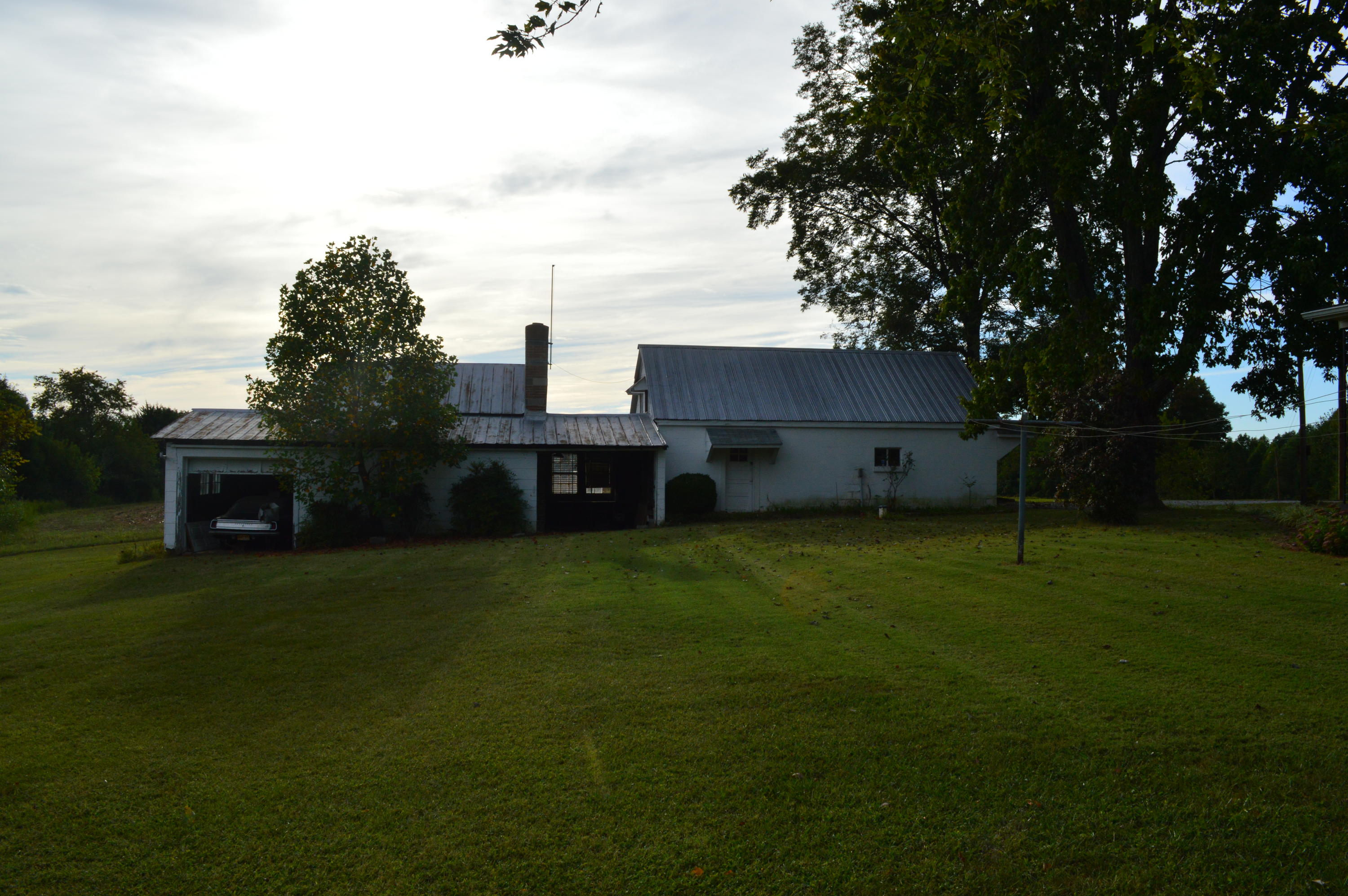 8745 Callands Road Chatham, VA 24531 - Photo 35 of 37 a view of a house with a backyard