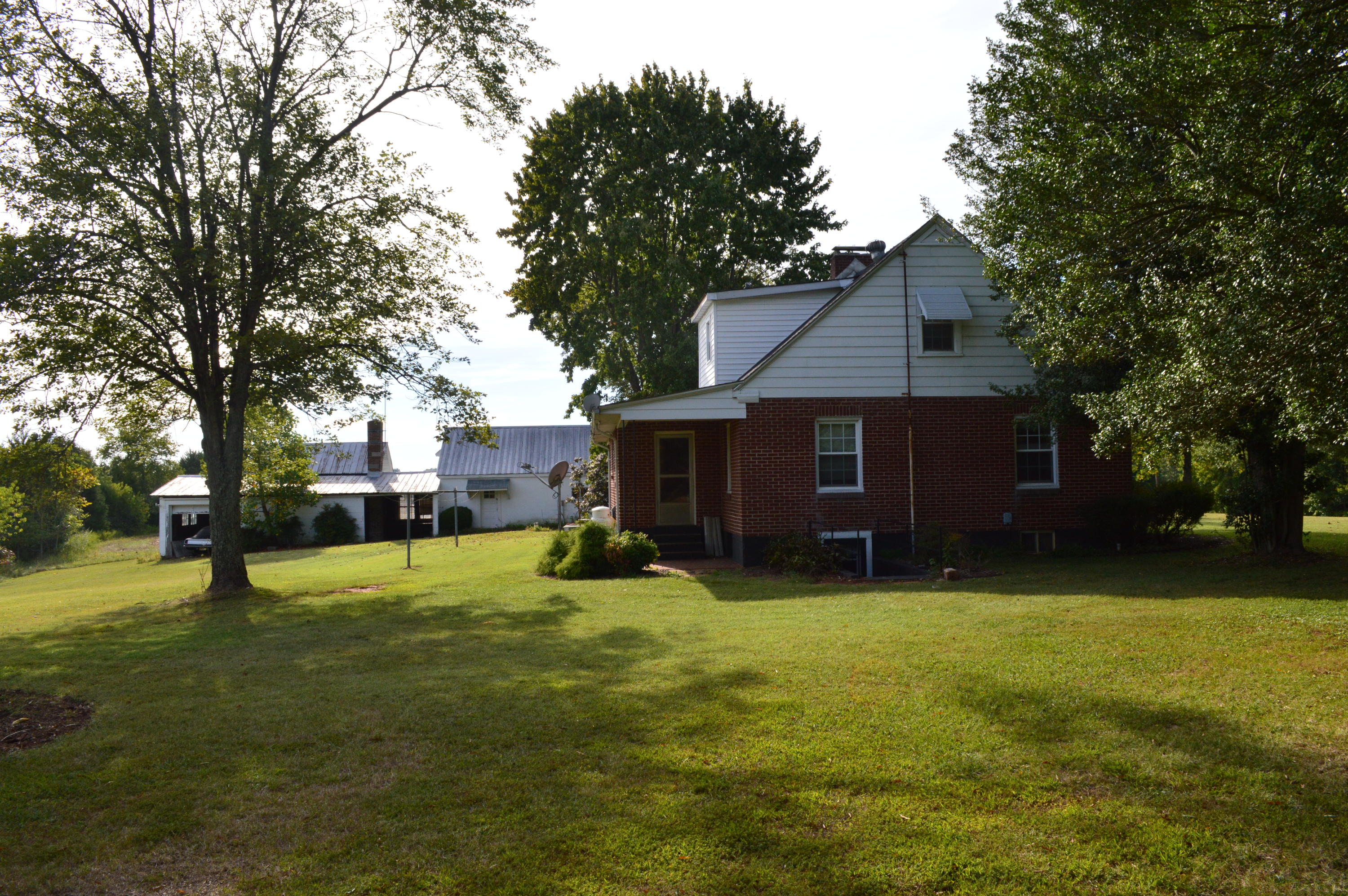 8745 Callands Road Chatham, VA 24531 - Photo 6 of 37 a view of a house with a yard