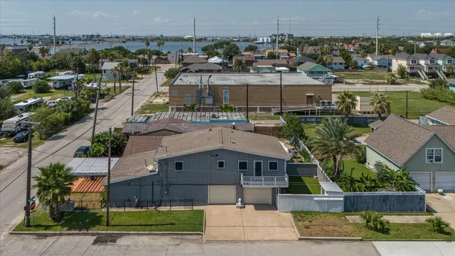 an aerial view of a house with a garden