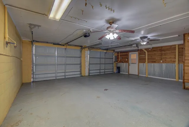 a view of a patio with wooden floor