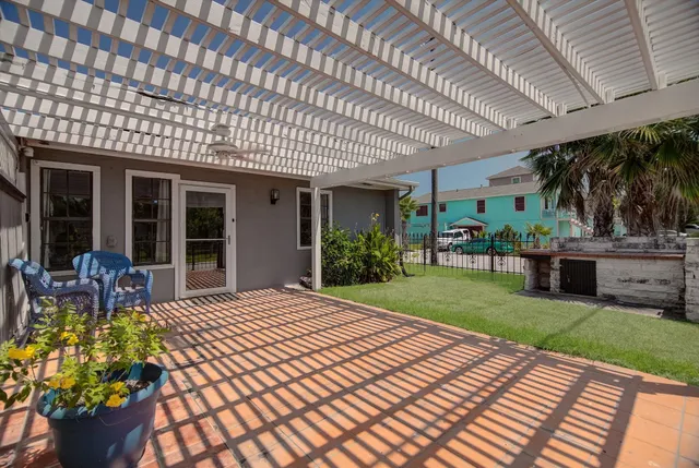 front view of a house with a swimming pool