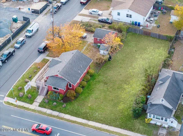 an aerial view of a house with a garden potted plants