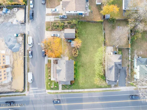 aerial view of residential houses with outdoor space