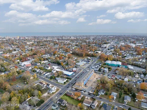 an aerial view of a city with lots of residential buildings