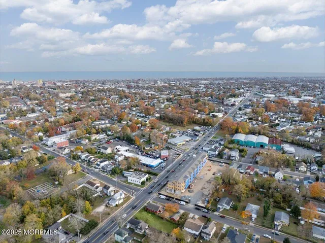 an aerial view of a city with lots of residential buildings