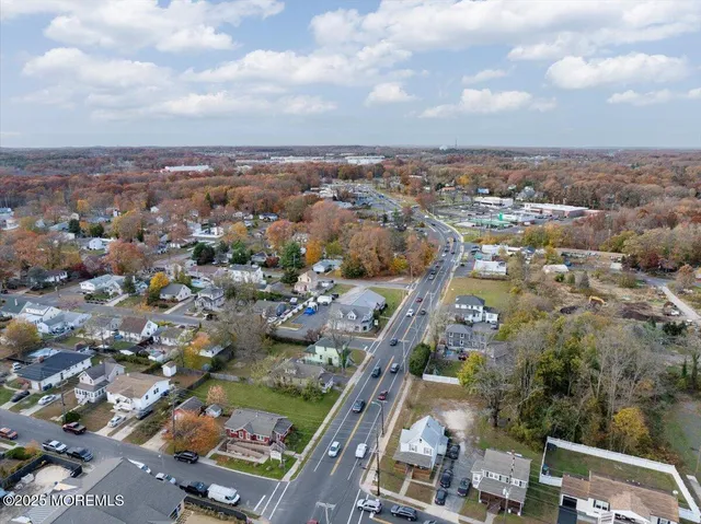 an aerial view of a city with lots of residential buildings