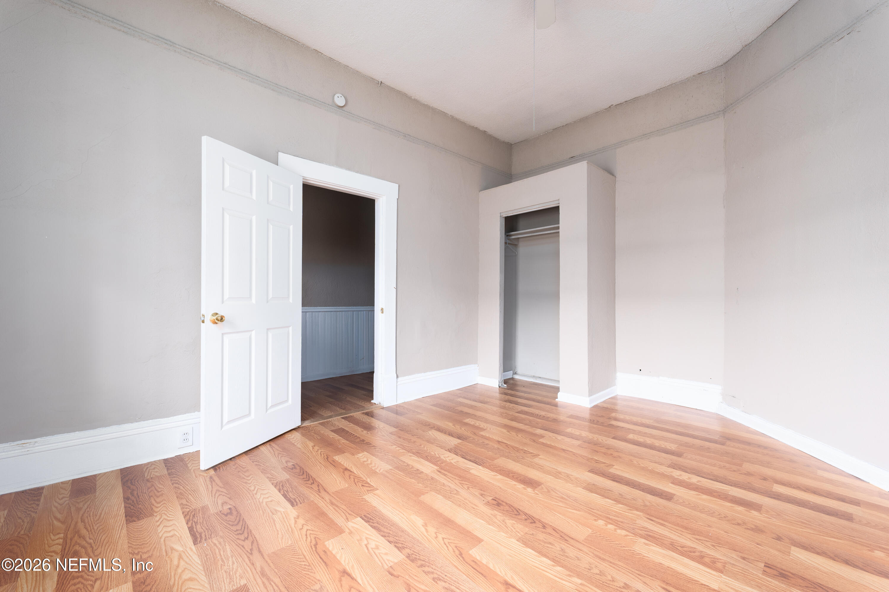 1222 Clark Street Jacksonville, FL 32206 - Photo 10 of 16 a view of an empty room with wooden floor