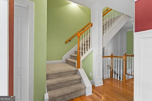 a view of a bathroom from a hallway