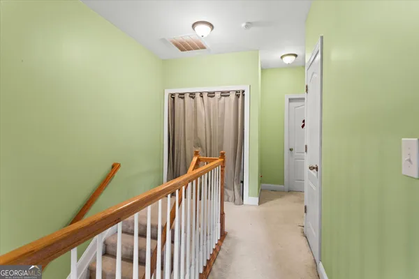 a bathroom with a sink a mirror and a toilet