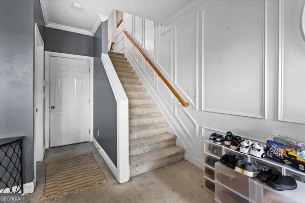 a view of balcony with wooden floor and fence