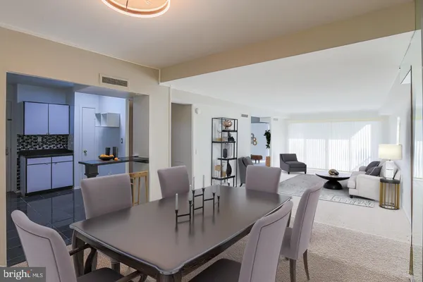 a view of a dining room with furniture