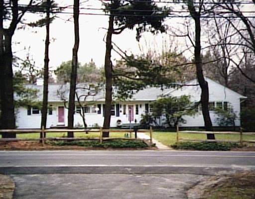 4 Hockanum Road Westport, CT 06880 - Photo 1 of 1 a view of a park with large trees