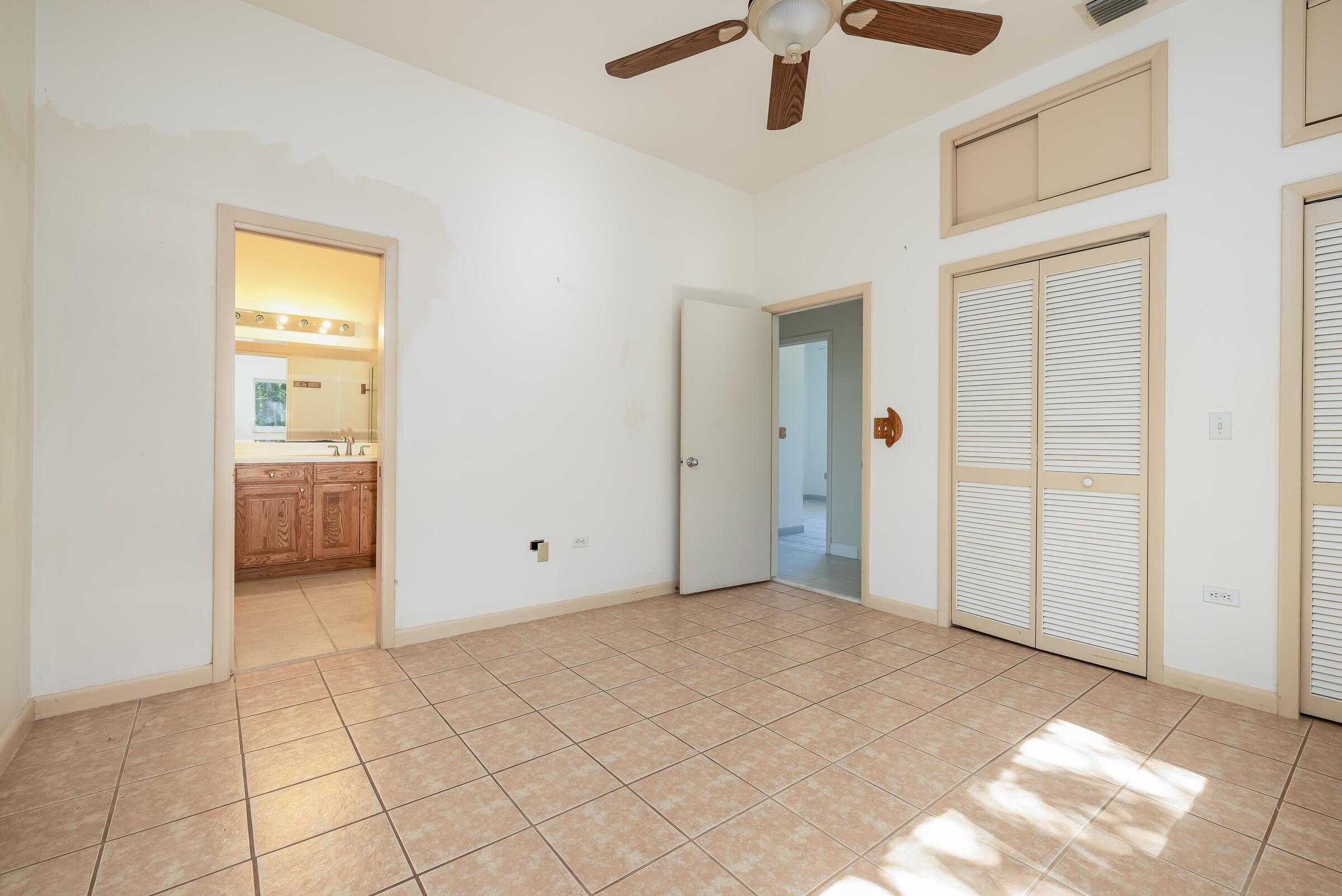 132 Galleon Road Islamorada, FL 33036 - Photo 21 of 38 an empty room with fan and windows