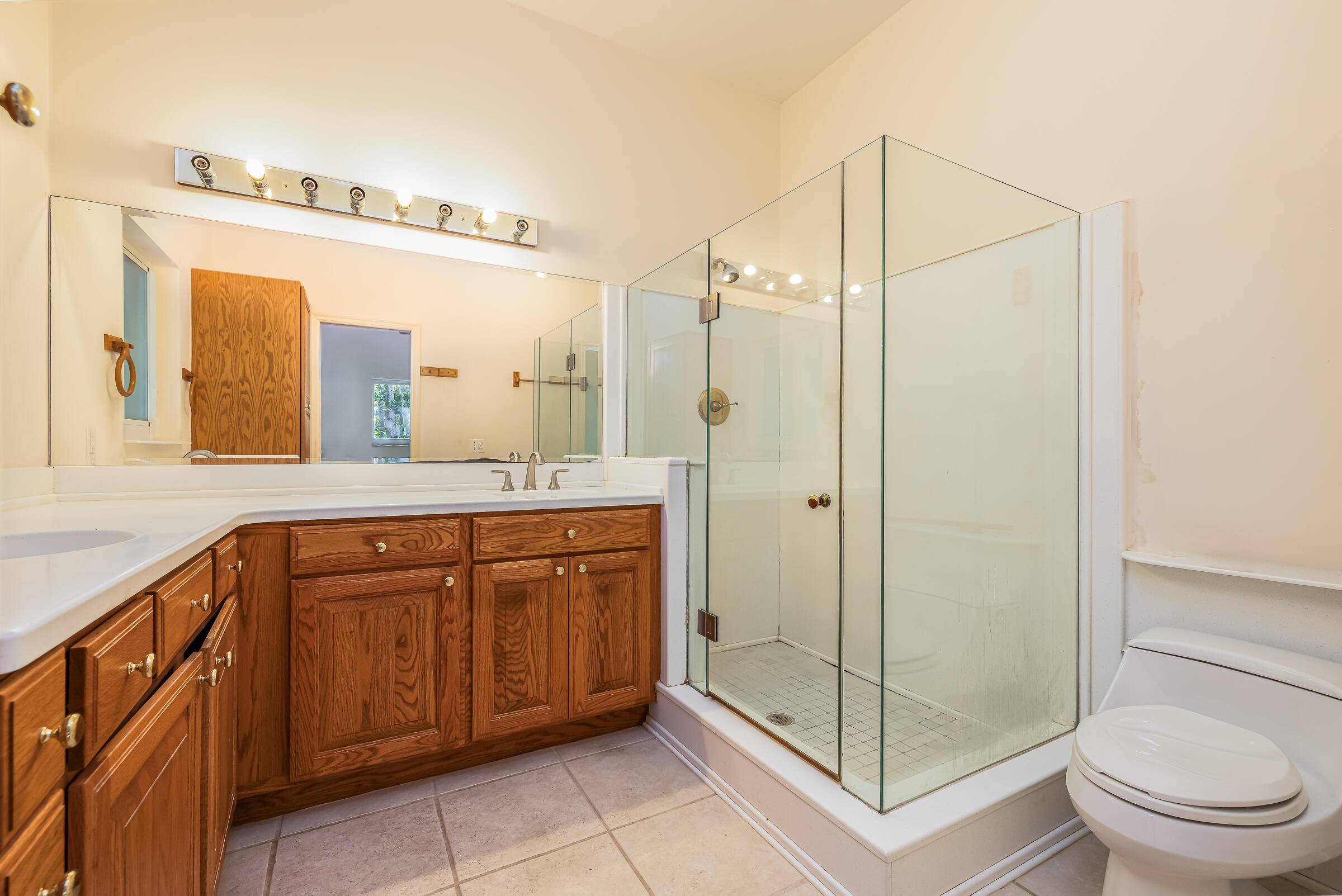 132 Galleon Road Islamorada, FL 33036 - Photo 23 of 38 a spacious bathroom with a shower sink and mirror