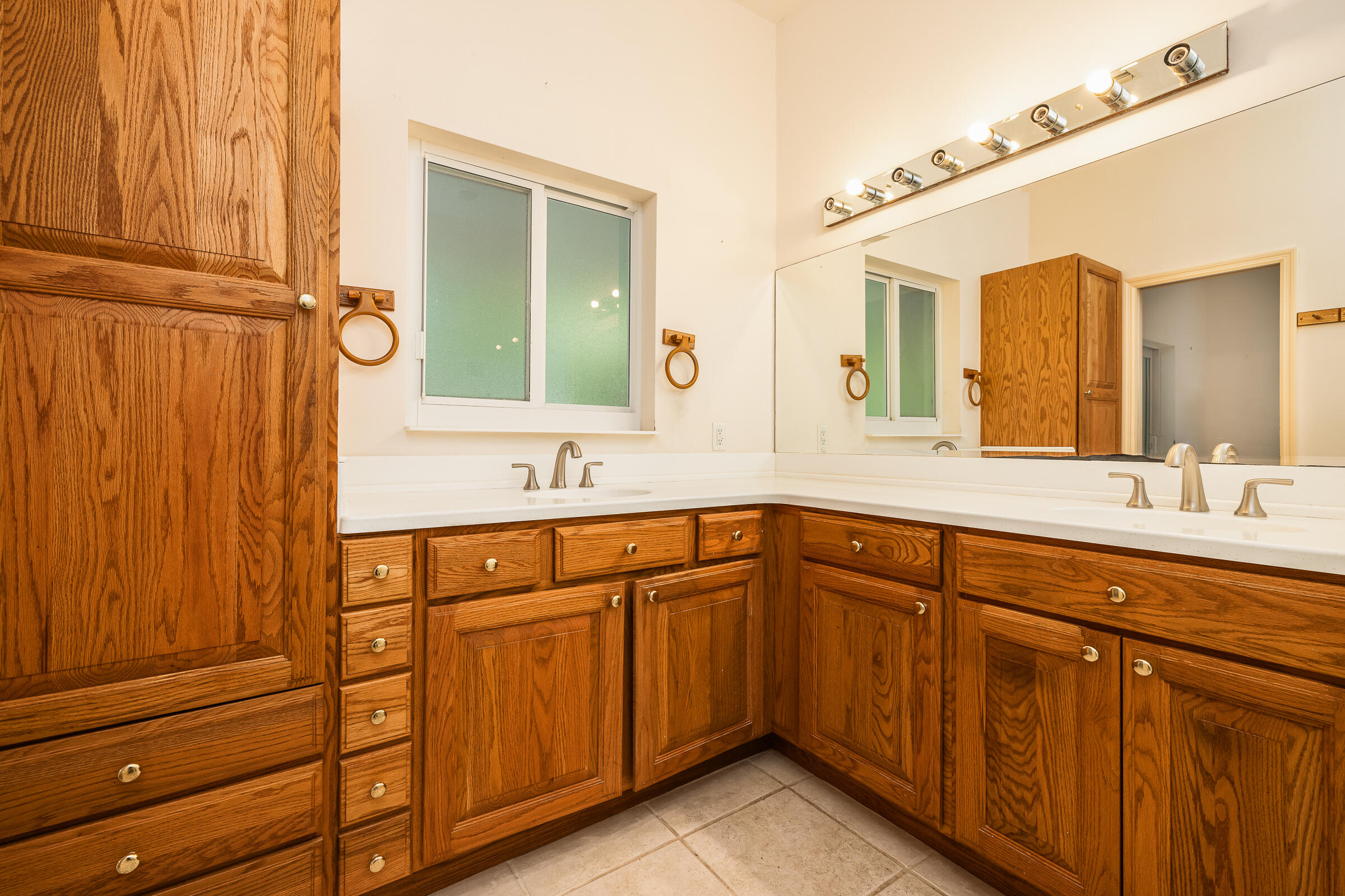 132 Galleon Road Islamorada, FL 33036 - Photo 24 of 38 a bathroom with a sink and a mirror