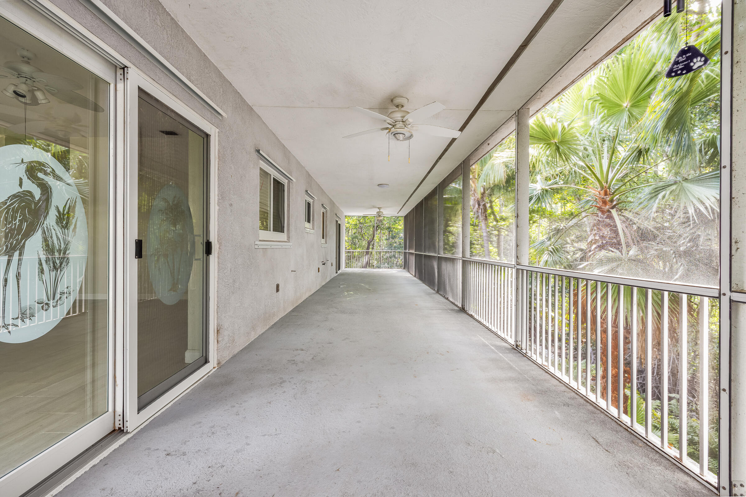 132 Galleon Road Islamorada, FL 33036 - Photo 27 of 38 a view of a porch with wooden floor and outdoor space