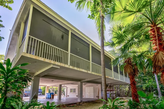 a view of a house with a street