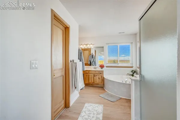 a bathroom with a sink double vanity and a mirror