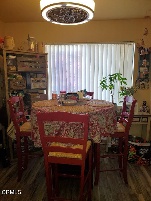 3077 Kelp Lane, Unit 108 Oxnard, CA 93035 - Photo 4 of 15 a view of a dining room with furniture and chandelier