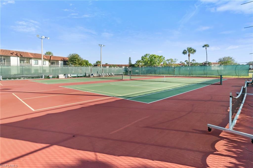 4363 27th Court Southwest, Unit 2103 Naples, FL 34116 - Photo 22 of 30 Tennis and pickleball courts.