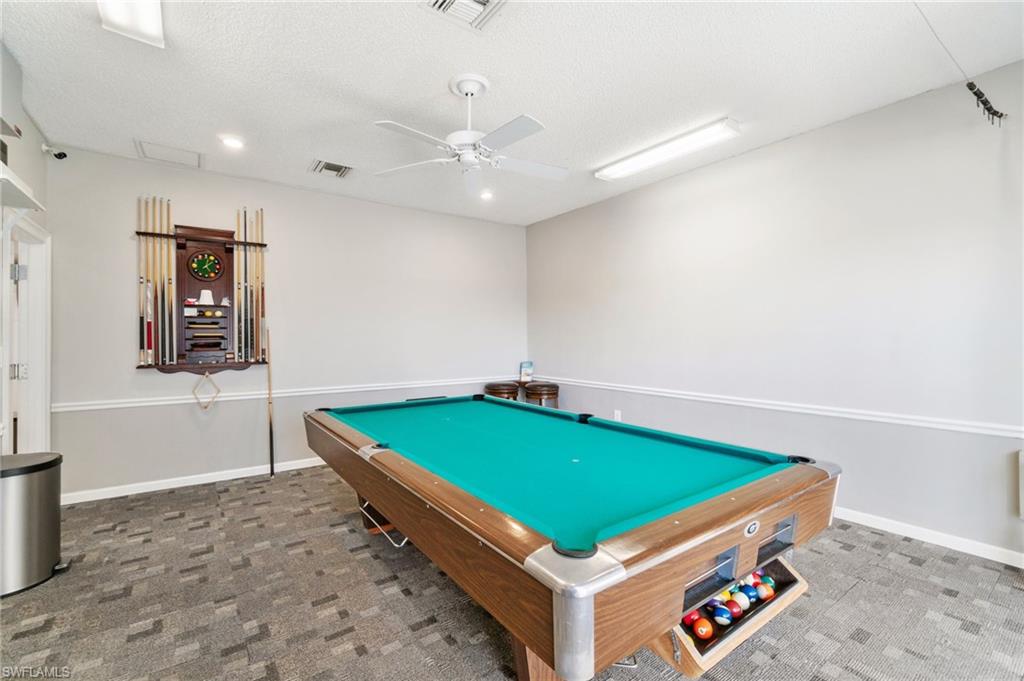 4363 27th Court Southwest, Unit 2103 Naples, FL 34116 - Photo 26 of 30 Billiards room within community room.