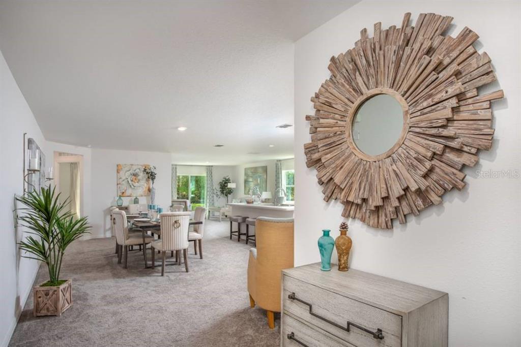 3392 East Odier Street Inverness, FL 34453 - Photo 23 of 24 a living room with furniture and a large window