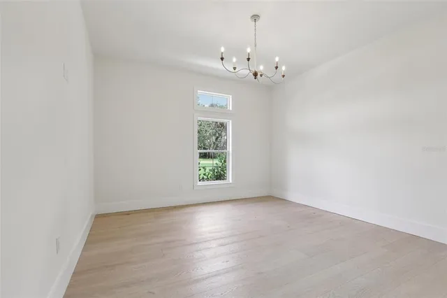 an aerial view of a house with a garden