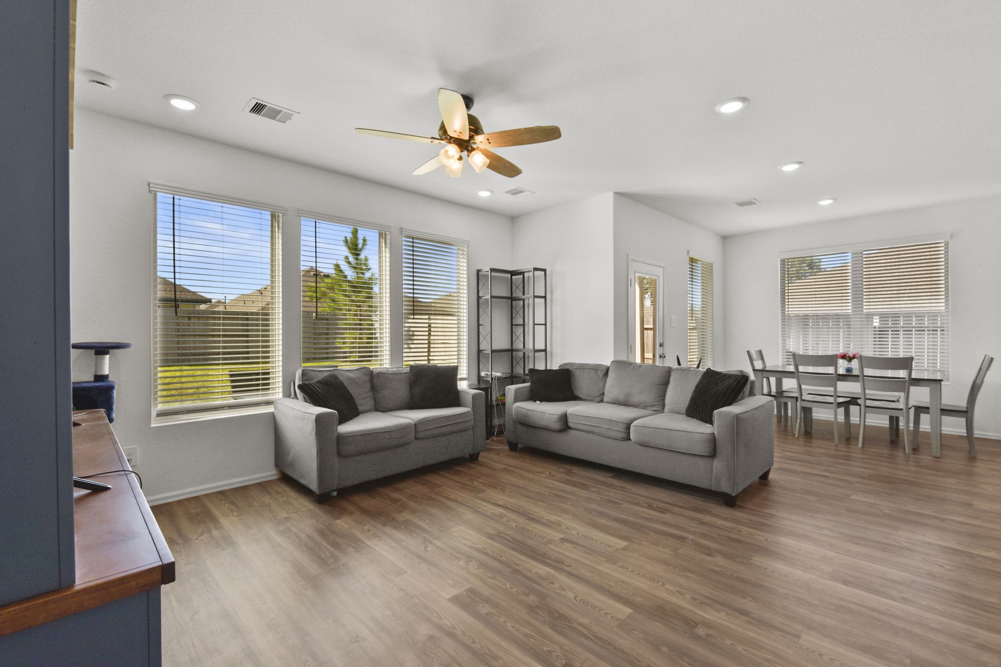 2851 Paradise Ridge Way Conroe, TX 77301 - Photo 11 of 33 a living room with furniture and a large window