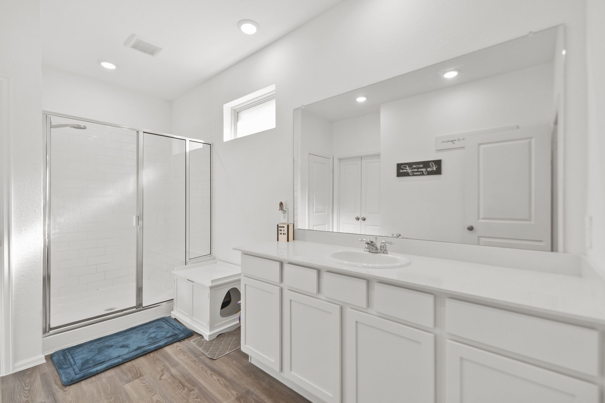 2851 Paradise Ridge Way Conroe, TX 77301 - Photo 16 of 33 a view of a sink and dishwasher with wooden floor