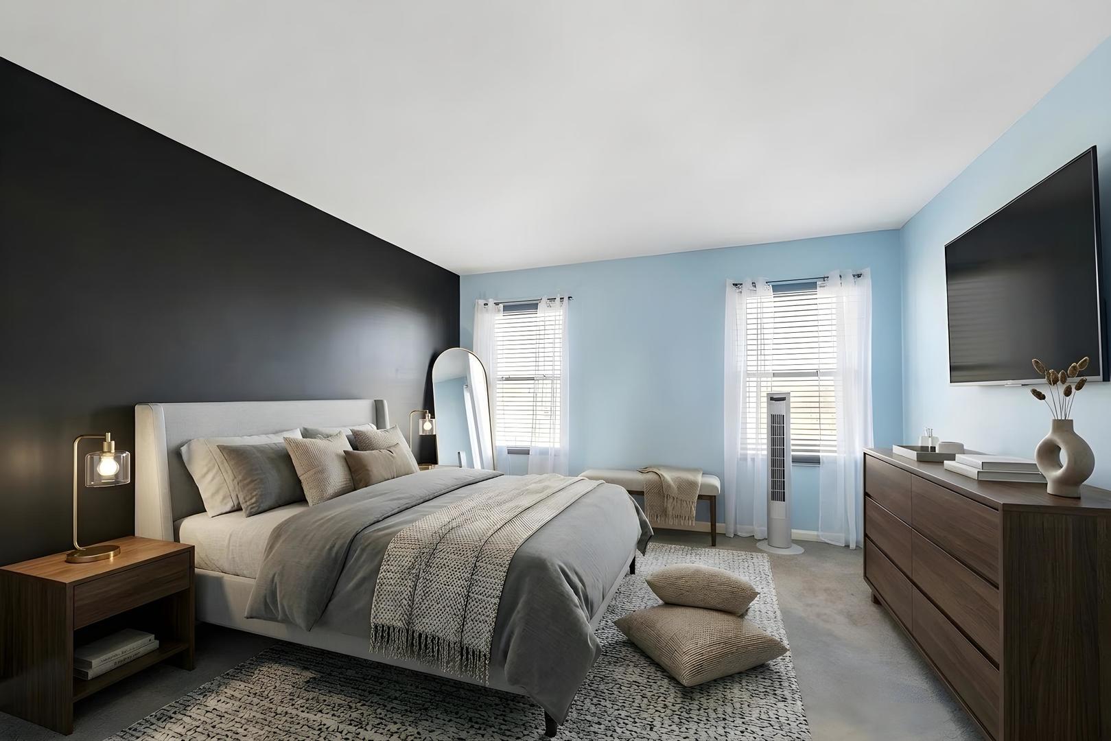 821 Red Barn Lane Elgin, IL 60124 - Photo 11 of 27 a bedroom with a bed and a flat screen tv
