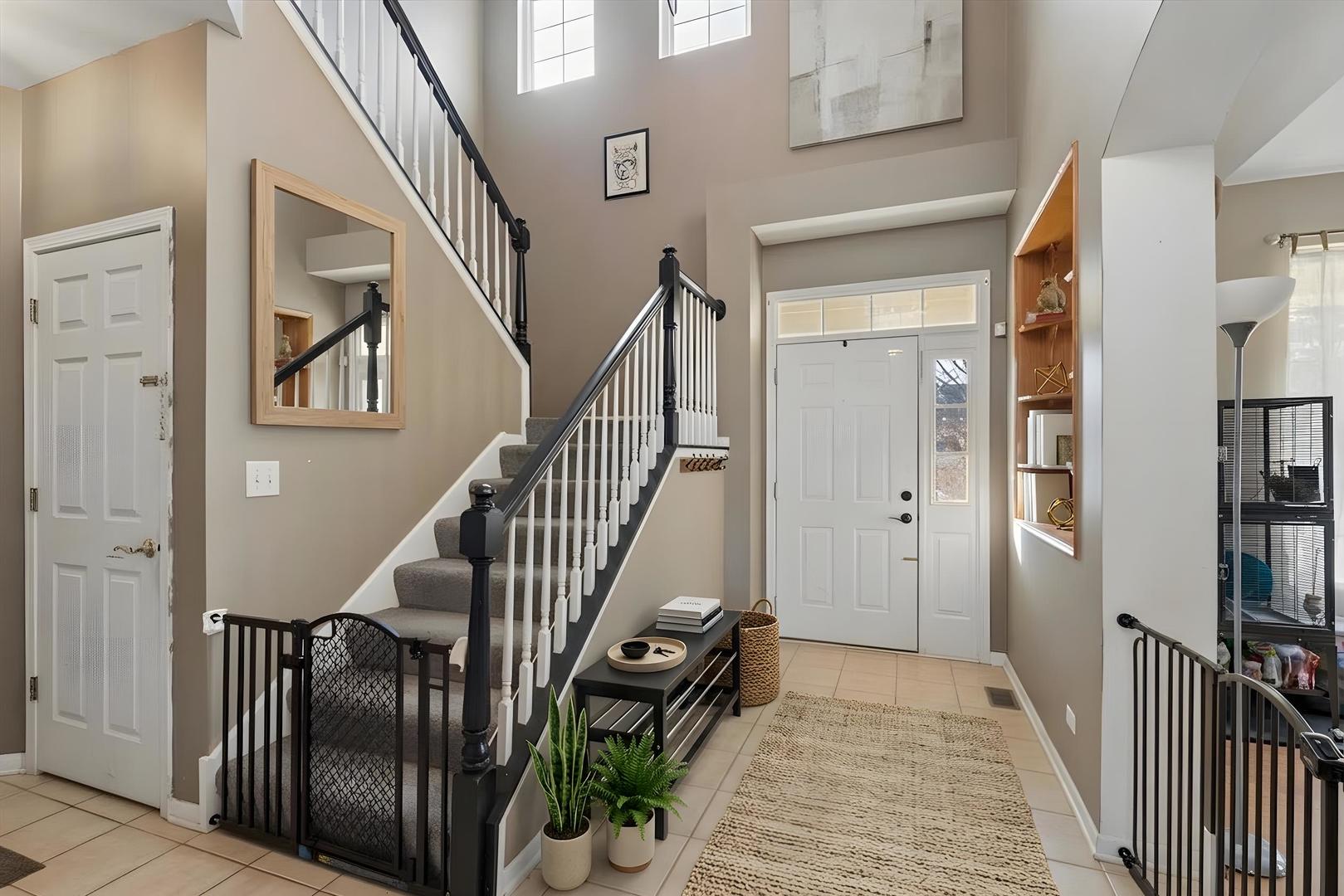 821 Red Barn Lane Elgin, IL 60124 - Photo 2 of 27 a view of an entryway with staircase