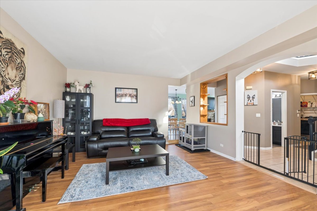 821 Red Barn Lane Elgin, IL 60124 - Photo 3 of 27 a living room with furniture and wooden floor