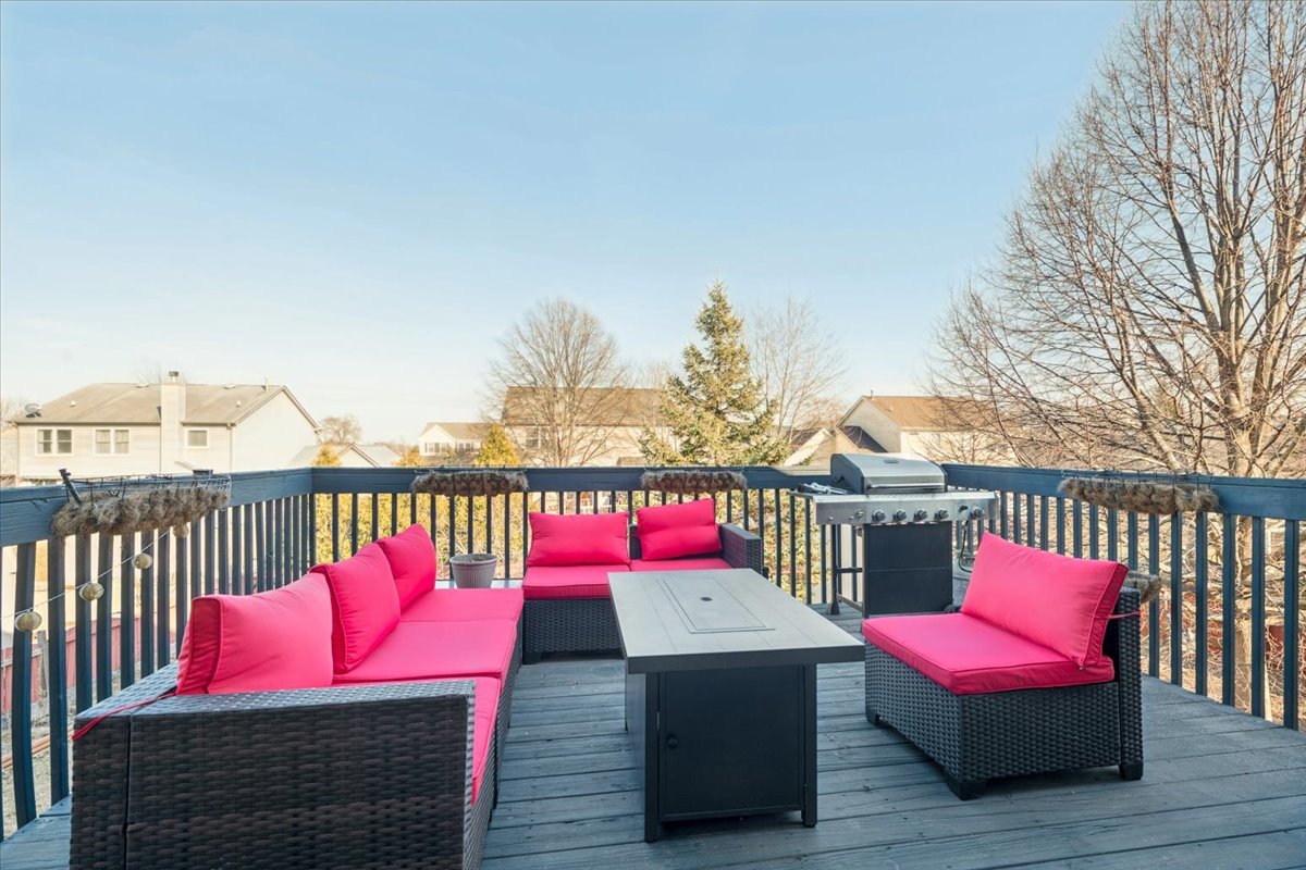 821 Red Barn Lane Elgin, IL 60124 - Photo 7 of 27 a view of a balcony with furniture