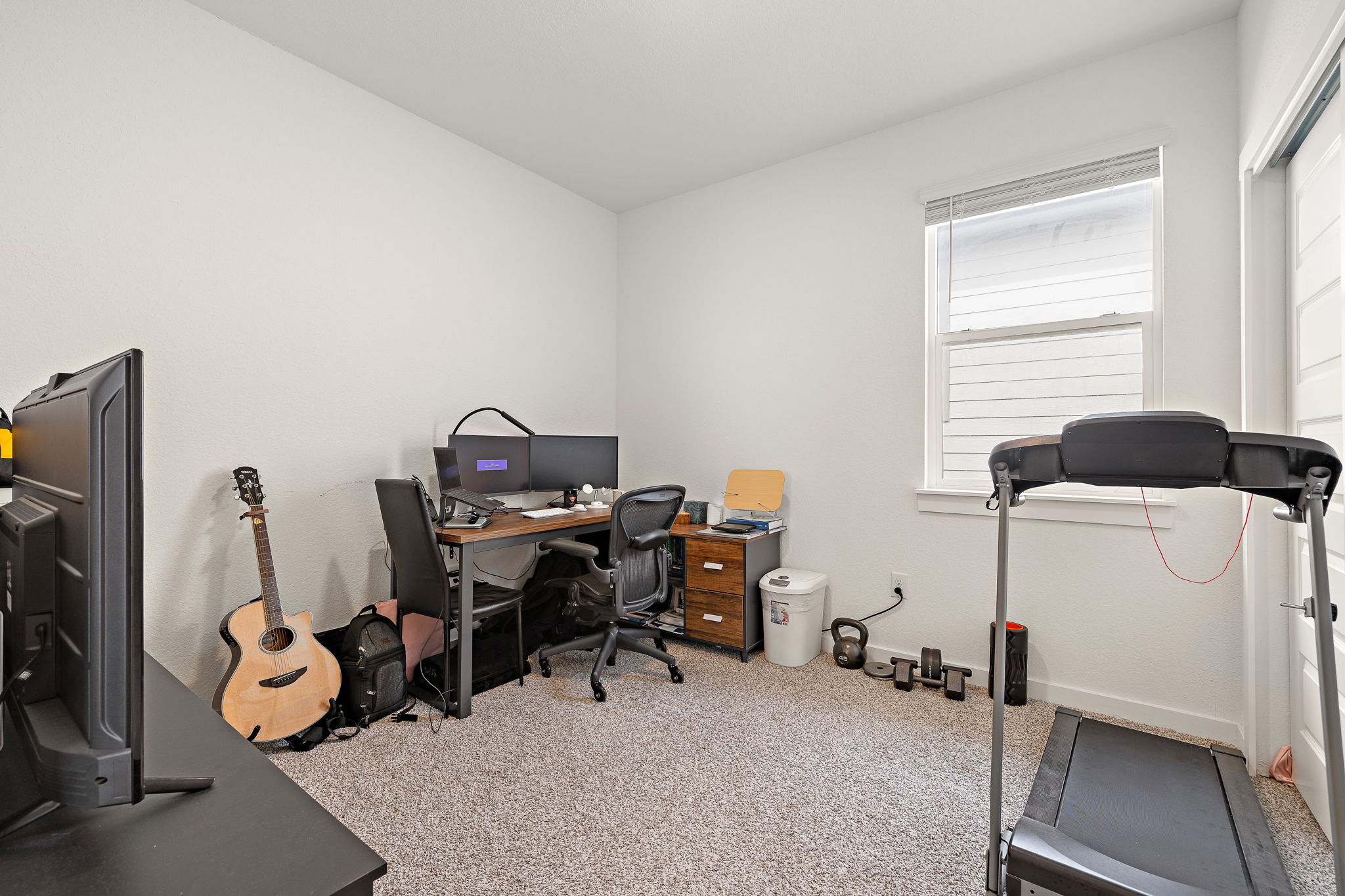 2313 Ranier Court Austin, TX 78754 - Photo 16 of 22 a view of a workspace with furniture and a window