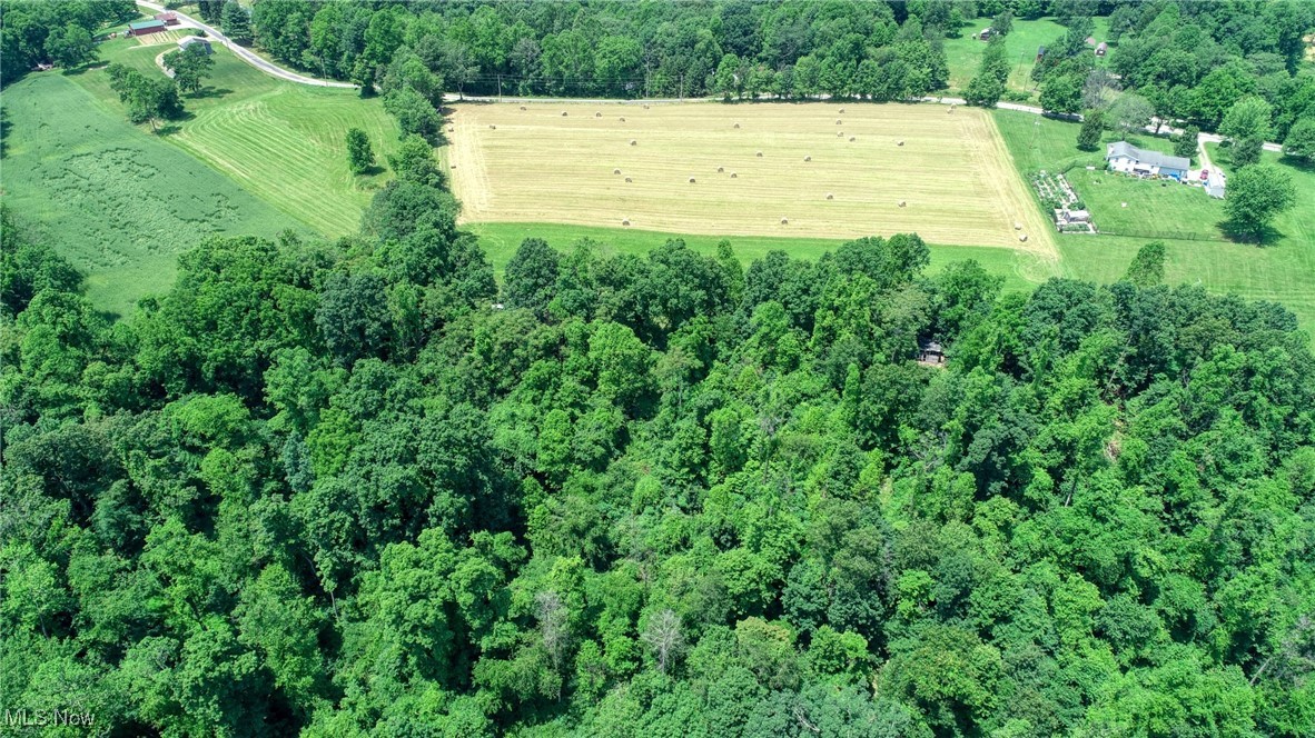 70870-70800 Norwalk Road Kimbolton, OH 43749 - Photo 2 of 7 Aerial view of property and surrounding area featuring rural landscape