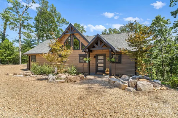 front view of a house with a small yard