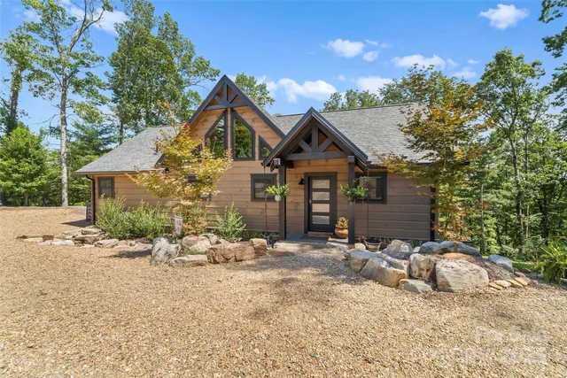 front view of a house with a small yard