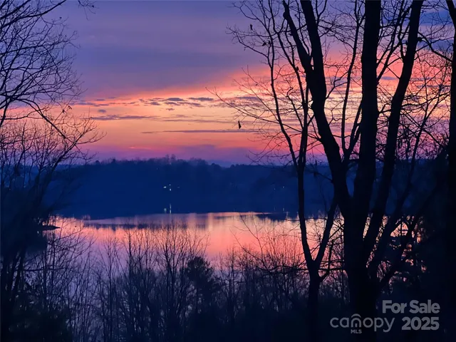a view of a chairs and table in the patio