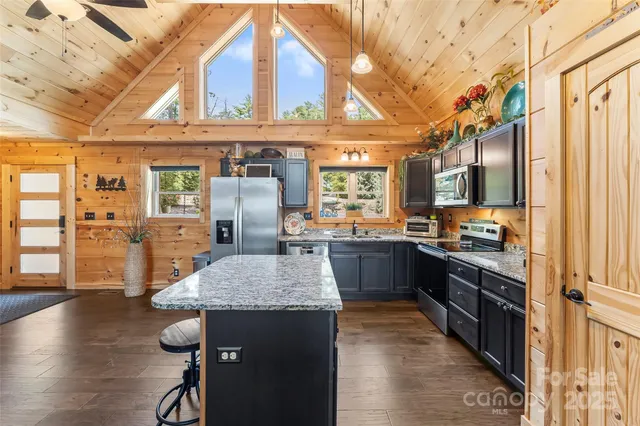 a view of a livingroom with furniture window and outside view