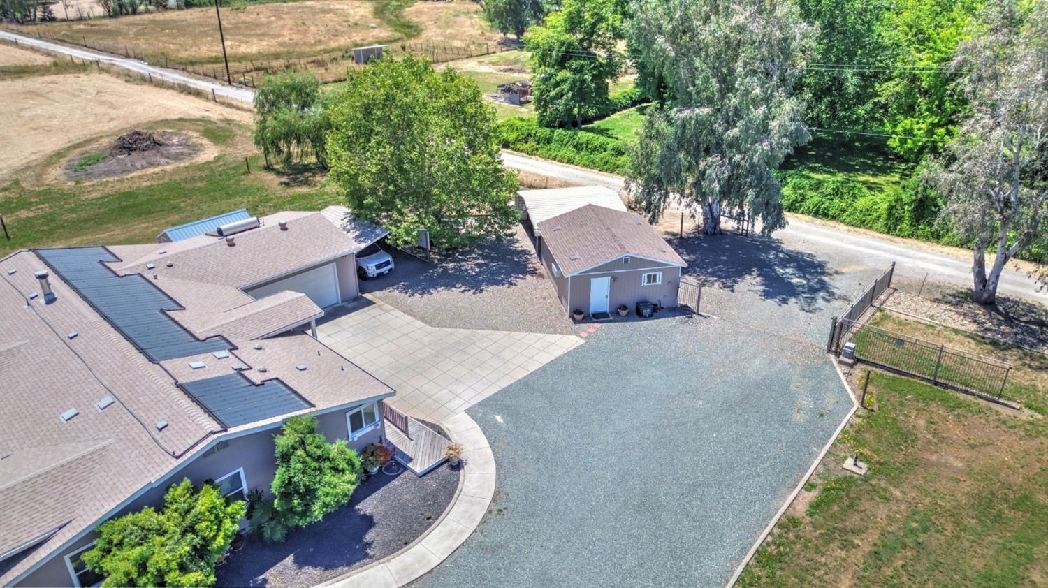12390 Hobday Road Wilton, CA 95693 - Photo 91 of 92 an aerial view of a house with outdoor space patio and mountain view
