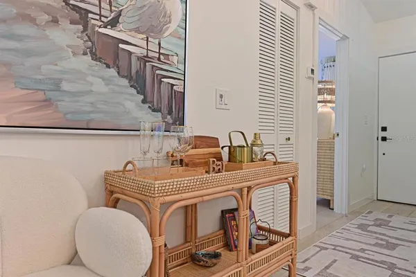 a view of a bedroom with furniture