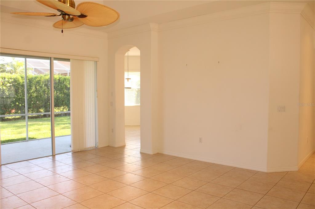 11257 28th St Circle East Parrish, FL 34219 - Photo 12 of 59 a view of an empty room with a window