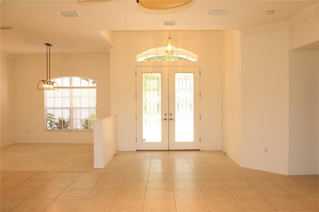 11257 28th St Circle East Parrish, FL 34219 - Photo 15 of 59 a view of an empty room with a window