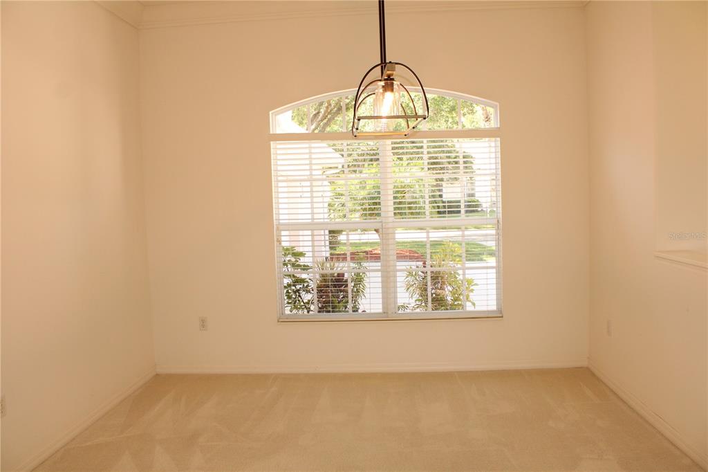 11257 28th St Circle East Parrish, FL 34219 - Photo 16 of 59 a view of empty room with window