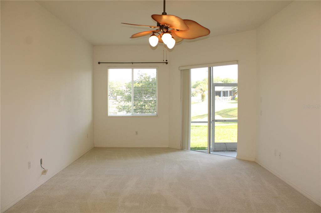 11257 28th St Circle East Parrish, FL 34219 - Photo 20 of 59 a view of room with window and ceiling fan